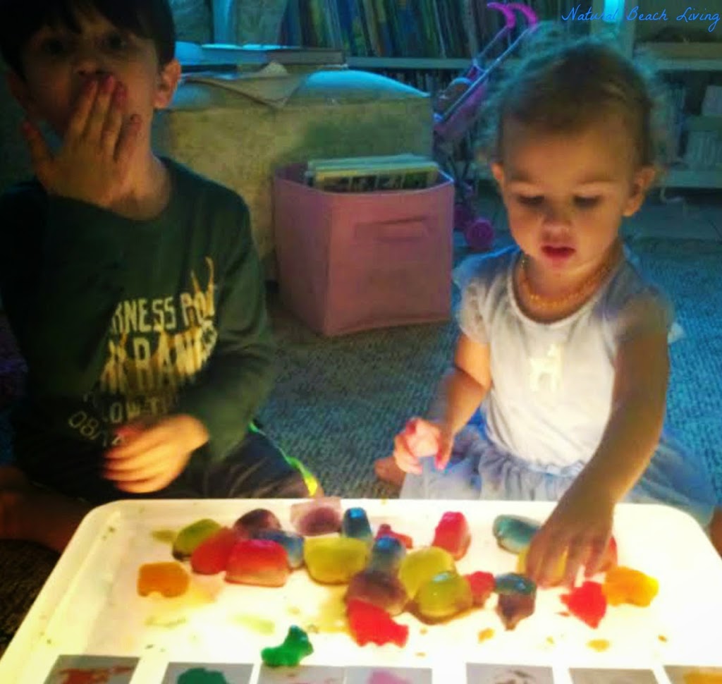 Continents, Montessori Inspired Homemade sensory play with light table and Montessori cards, perfect for Continent study www.naturalbeachliving.com