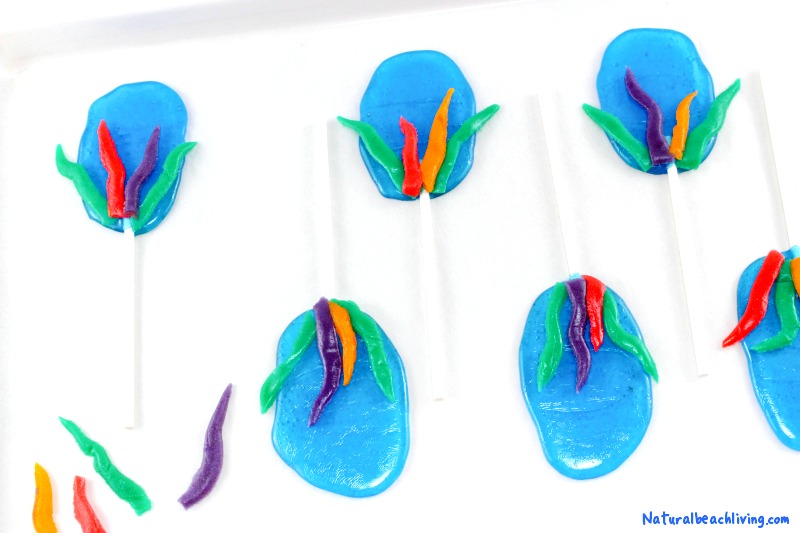The Best Shark Themed Snacks for Kids, Yummy Shark Suckers or Homemade Shark Lollipops if you prefer for a delicious Shark Week snack idea, So if you are having a Shark theme Party  or looking for Ocean Theme Snacks, these Jolly Rancher Lollipops are an Easy Recipe to make