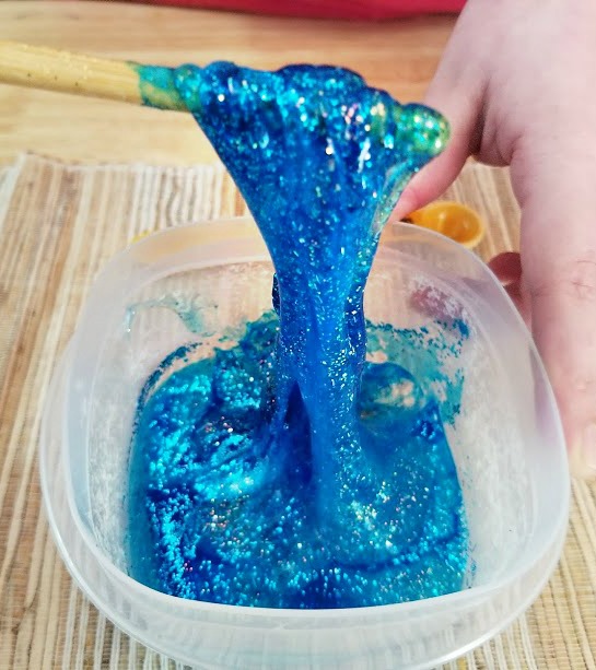 How to Make Slime with Contact Solution, Superhero Glitter Slime Recipe with Free Printables, This homemade Slime Recipe is perfect for a Superhero Birthday Party Theme, This DIY Glitter Slime also makes a great gift idea for Kids, how to make slime with contact solution and baking soda, Best Slime Recipes for Kids, Slime Recipe with Saline Solution