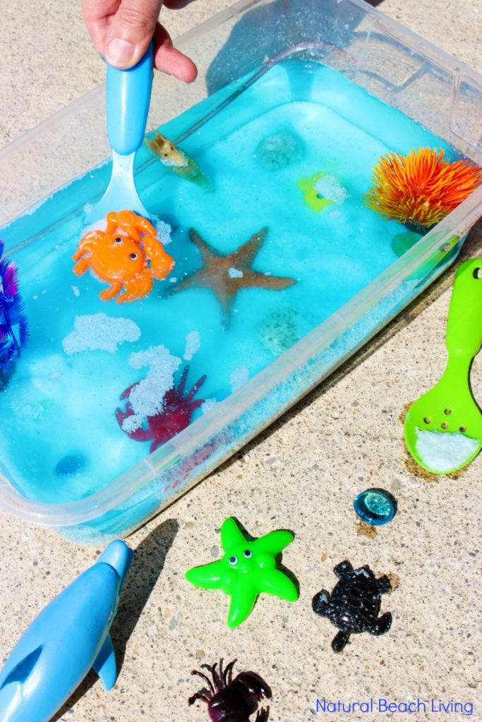 This Ocean Sensory Bin is easy to put together with a few simple under the sea theme items your children will spend hours playing with it. If you are doing an Ocean Theme for Preschoolers, sensory play and Under The Sea activities are perfect for hands on learning, Under the sea sensory bins are great for an Ocean Unit Study too.