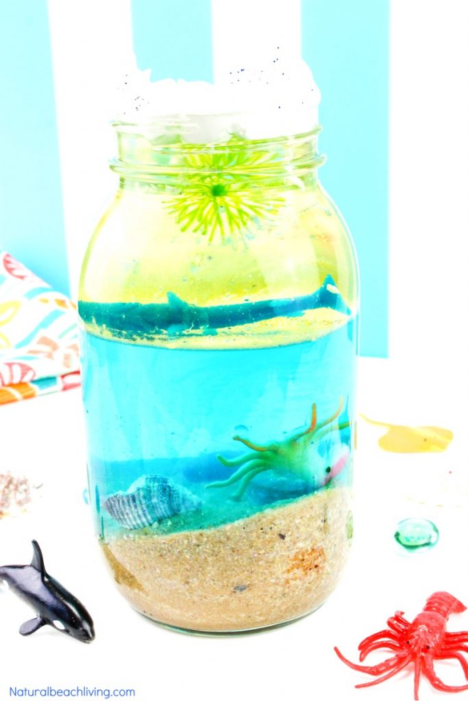 Ocean Science for Kids, a simple Ocean water experiment to teach kids about density. It's a perfect kitchen science experiment or outdoor science activity that works for an ocean unit. The perfect STEM activity for kids. Simple ocean activities for preschoolers in science with hands on activities and Ocean Theme Printables