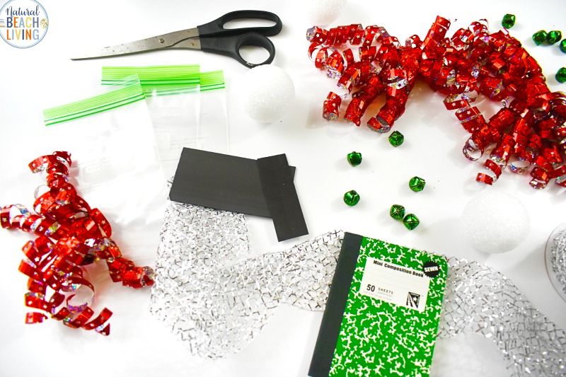 Santa's STEM Activities for Kids, this Santa's STEM Activities idea is perfect for holiday hands on activities, Santa's STEM Activities for Preschoolers, Christmas STEM, have your countdown to Christmas start with a STEM box or Christmas Tinker Tray. Free STEM Printable 