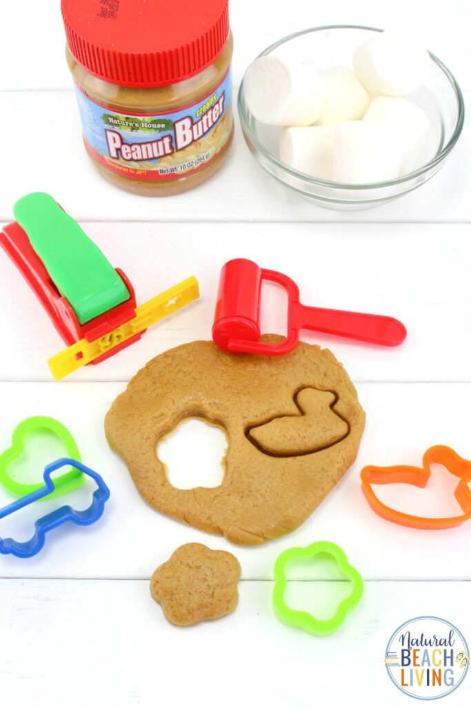This Peanut Butter Playdough is so simple and easy to make! All you need are three ingredients and you'll have a fun sensory activity perfect for toddlers and preschoolers. This Peanut Butter Playdough with marshmallows is The Best Edible playdough around. Make this Peanut Butter Playdough Recipe Soon. 