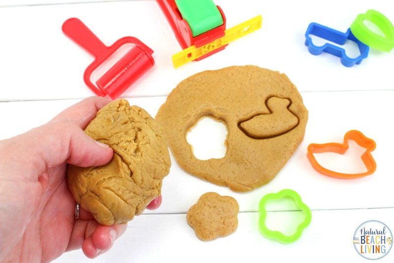 This Peanut Butter Playdough is so simple and easy to make! All you need are three ingredients and you'll have a fun sensory activity perfect for toddlers and preschoolers. This Peanut Butter Playdough with marshmallows is The Best Edible playdough around. Make this Peanut Butter Playdough Recipe Soon. 
