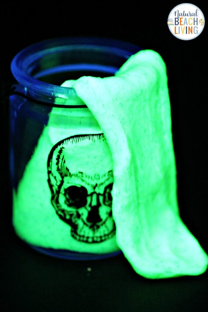 This Glow in the Dark Slime is a perfect Halloween activity or just a great sensory activity for children of all ages. Everyone loves slime! Plus we have The Best Slime Recipe with Contact Solution ideas including How to make clear slime, jiggly slime, Slime Supplies and so much more. 